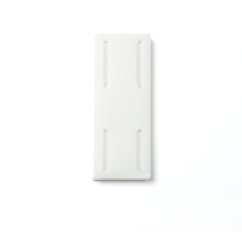 Plakbare afneembare stekkerdoos ophanging - Design Meubelz